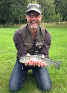 Guy with his first ever fish!