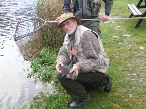 John O with his 'ill gotten gain'! Note John M's grip on the landing net!